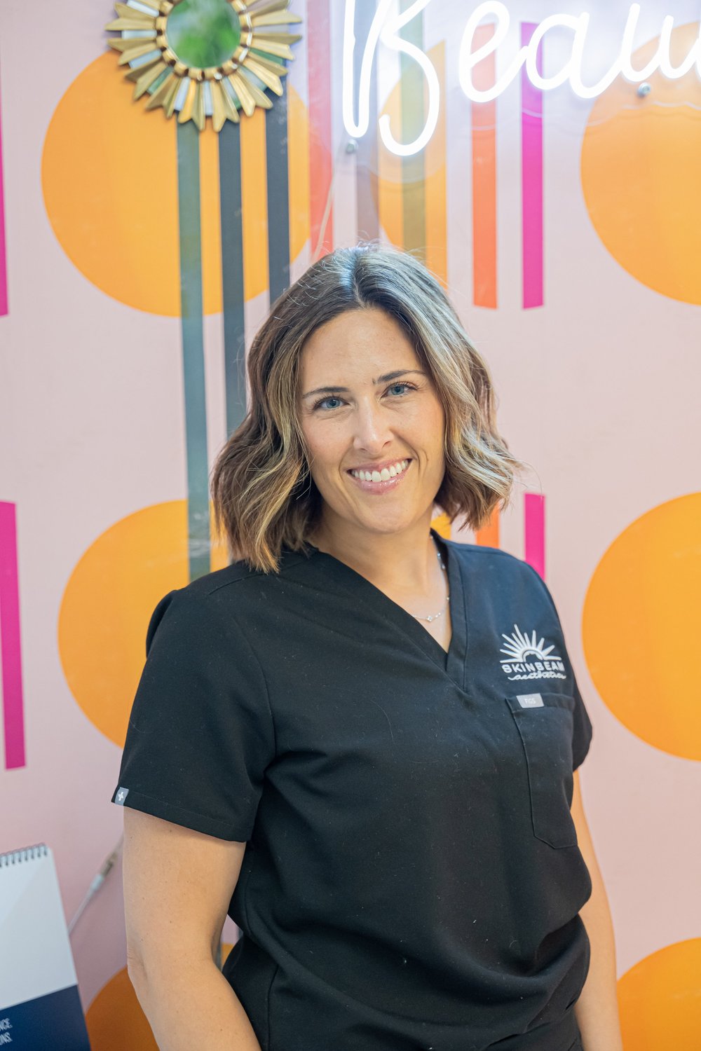 Claire Vercammen in black Skinbeam scrubs