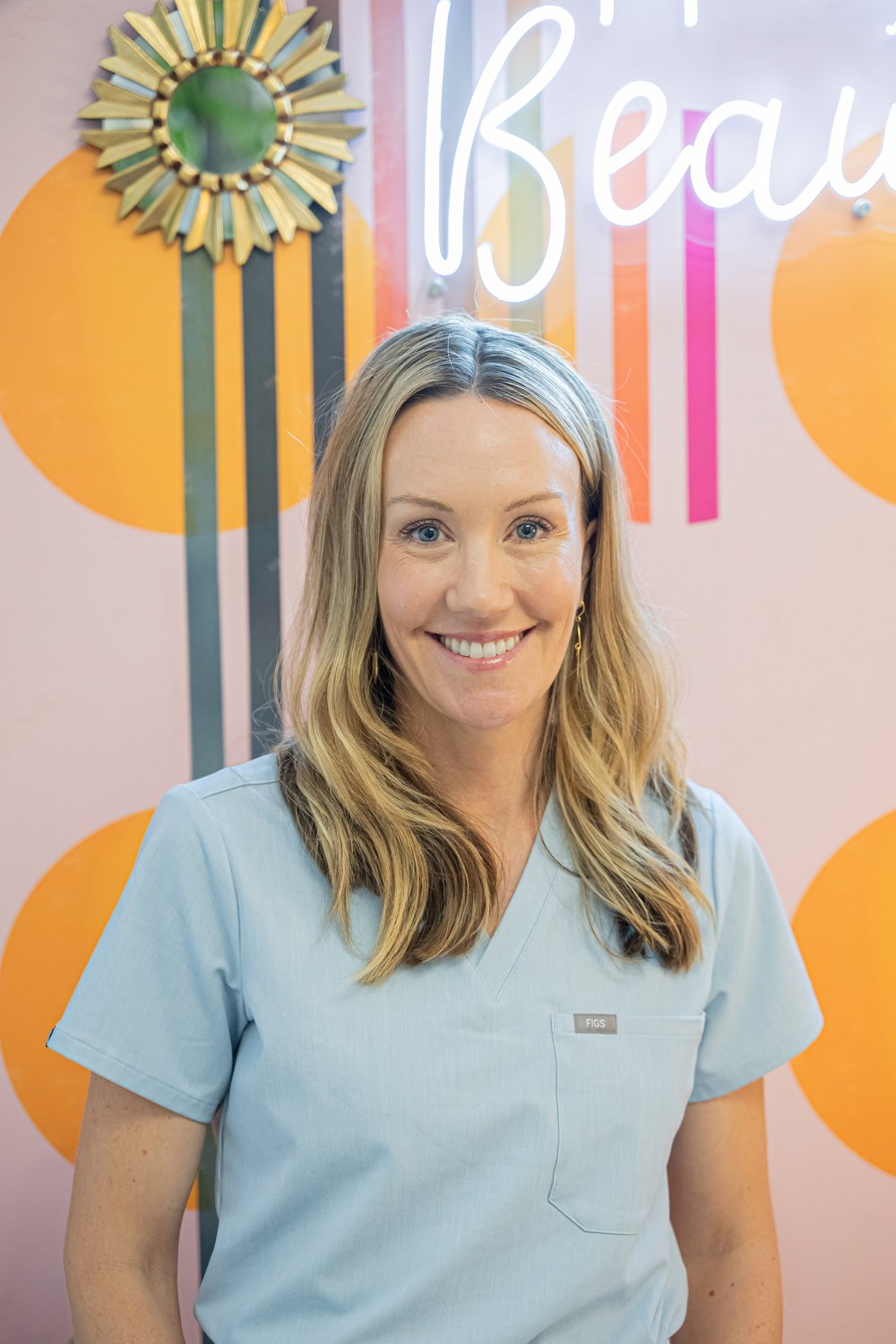 Jaine Chapman in light blue scrubs